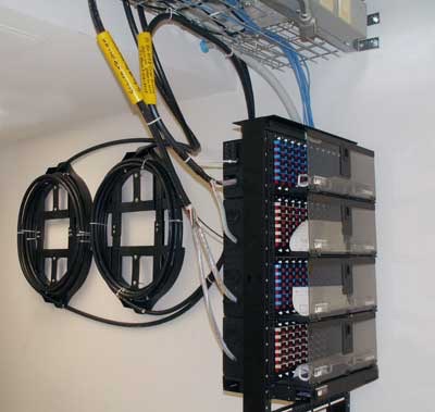 Structured cabling and fiber equipment installed in a communications rack